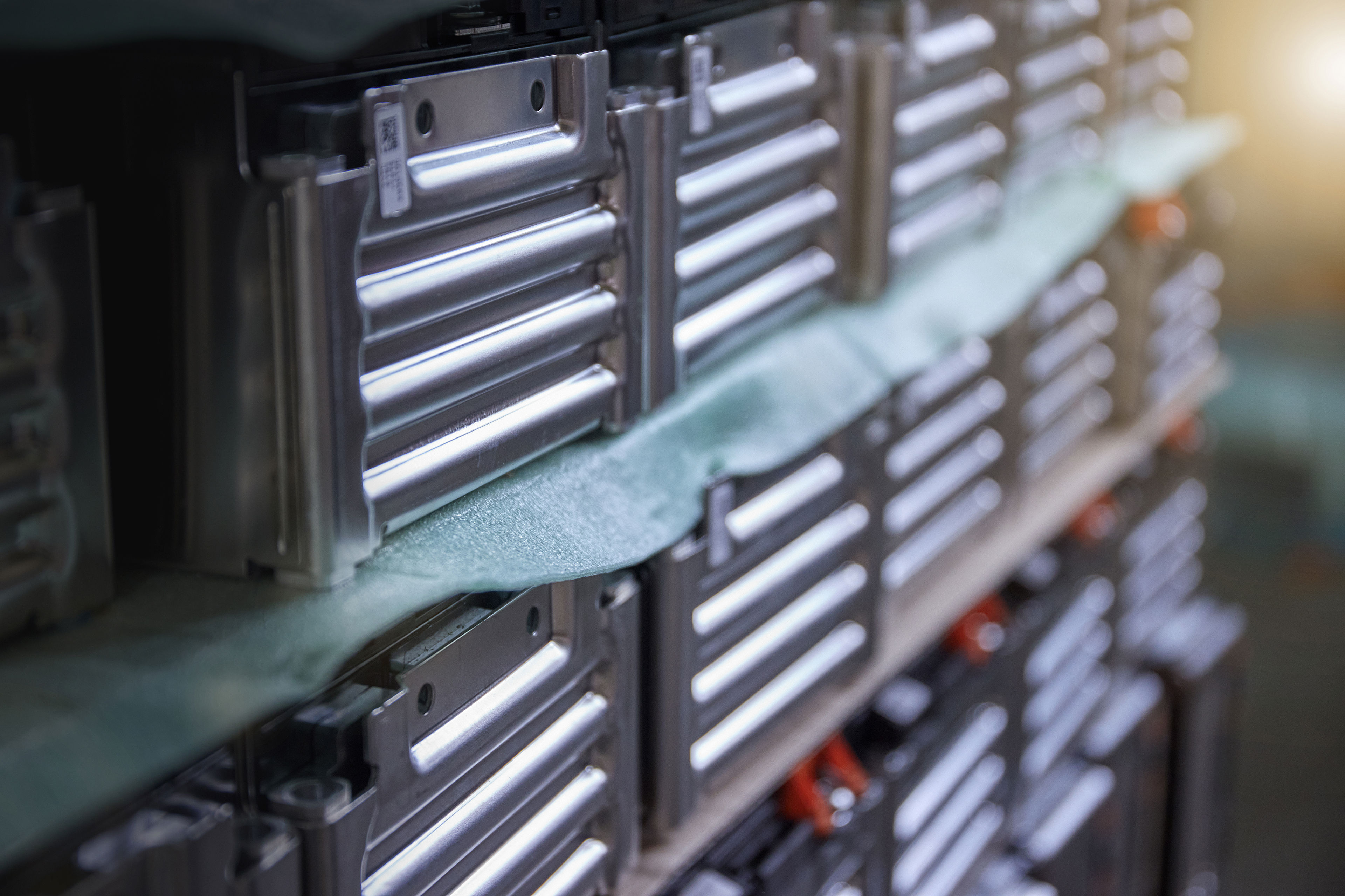 Rows of electric vehicle batteries waiting to be recycled or reused by Stena Recycling