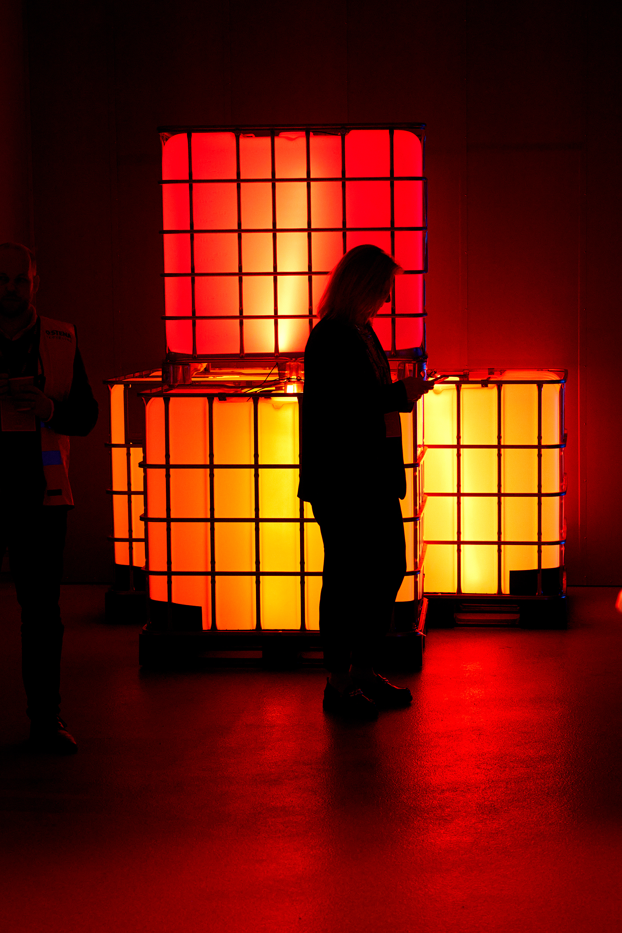 A persons silhouette at the grand opening of Stena Battery Recycling Center in Halmstad, Sweden