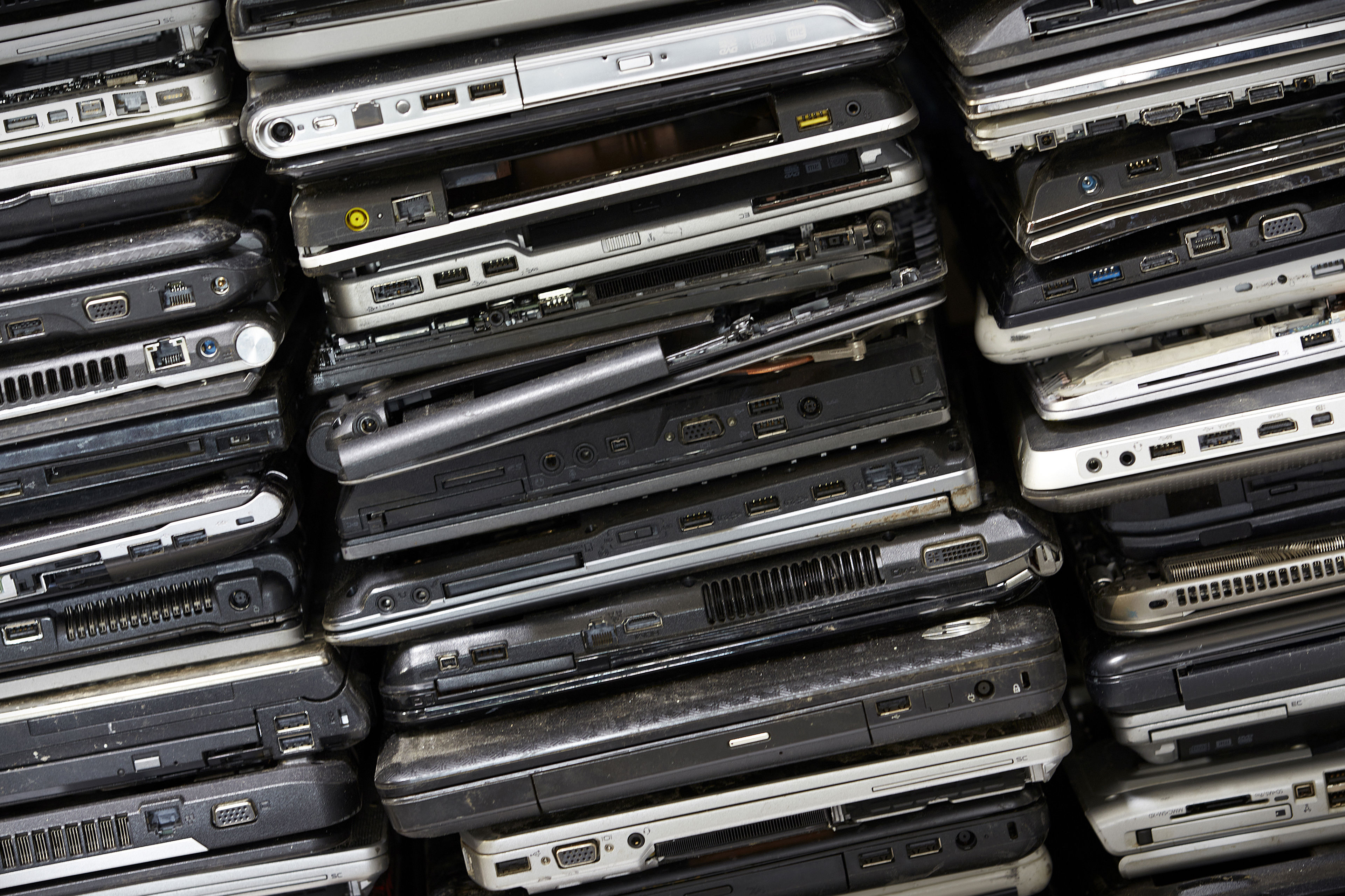 A pile of laptops ready to be recycled by Stena Recycling